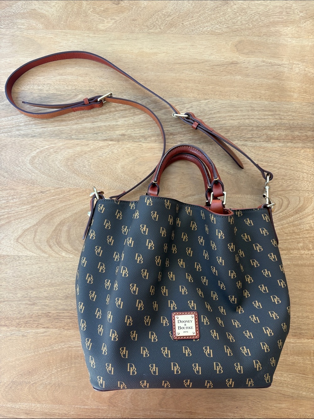 Dooney & Bourke Brown Monogram Tote with Reddish-Brown Trim